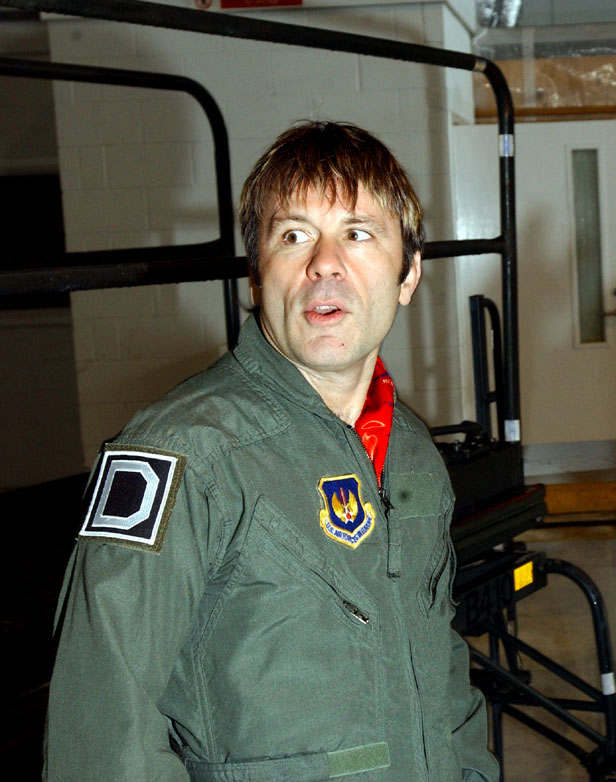 There goes the siren that warns of the air raid...