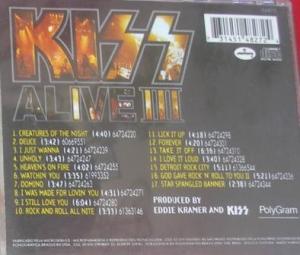 A contracapa do álbum e a lista das músicas.